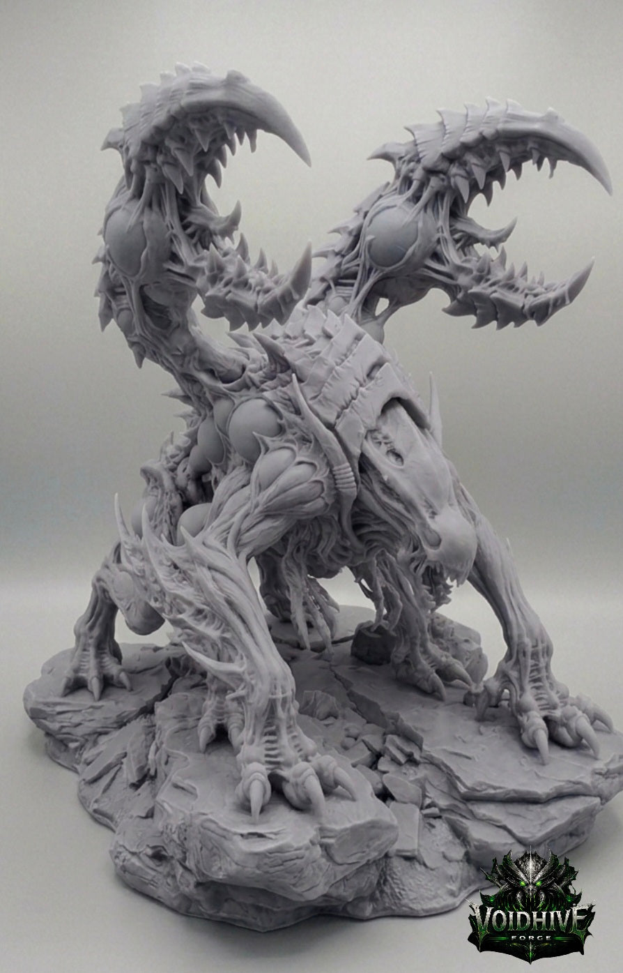 Armoured bioform, two curved scythe arms at sides, hunched pose, detailed chitin plating, scenic rubble base